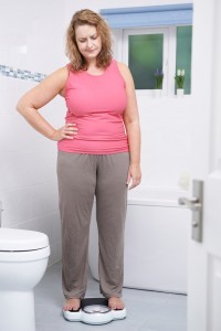 Your Sugar Land dentist discusses the important link between periodontal disease and obesity.